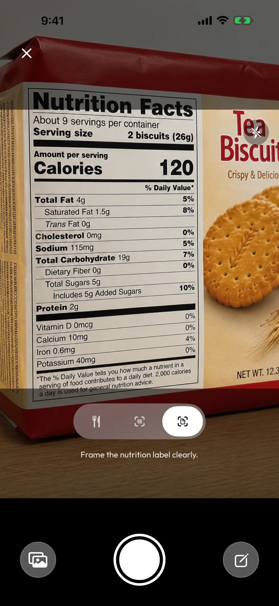 The Nutrition label scanner: a Tea Biscuits box with its Nutrition Facts panel filling the viewfinder, with the "Frame the nutrition label clearly." prompt